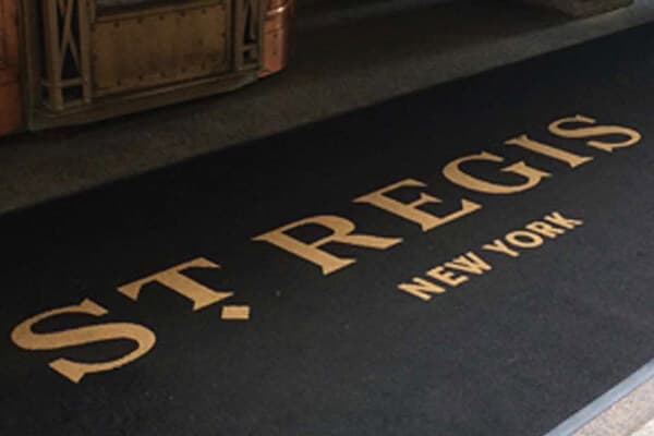 Gold lettered hotel mat at the St. Regis Hotel in New York