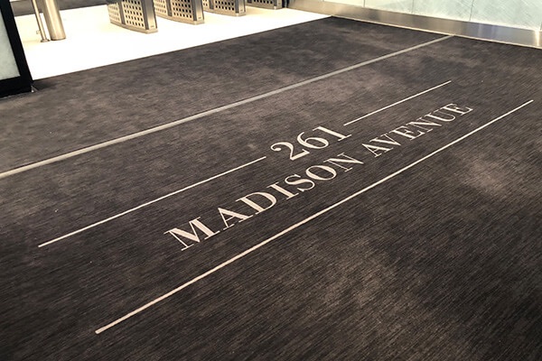 Custom lobby entrance mat at a commercial office building