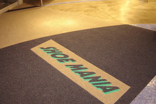 Shoe Mania custom logo entrance mat